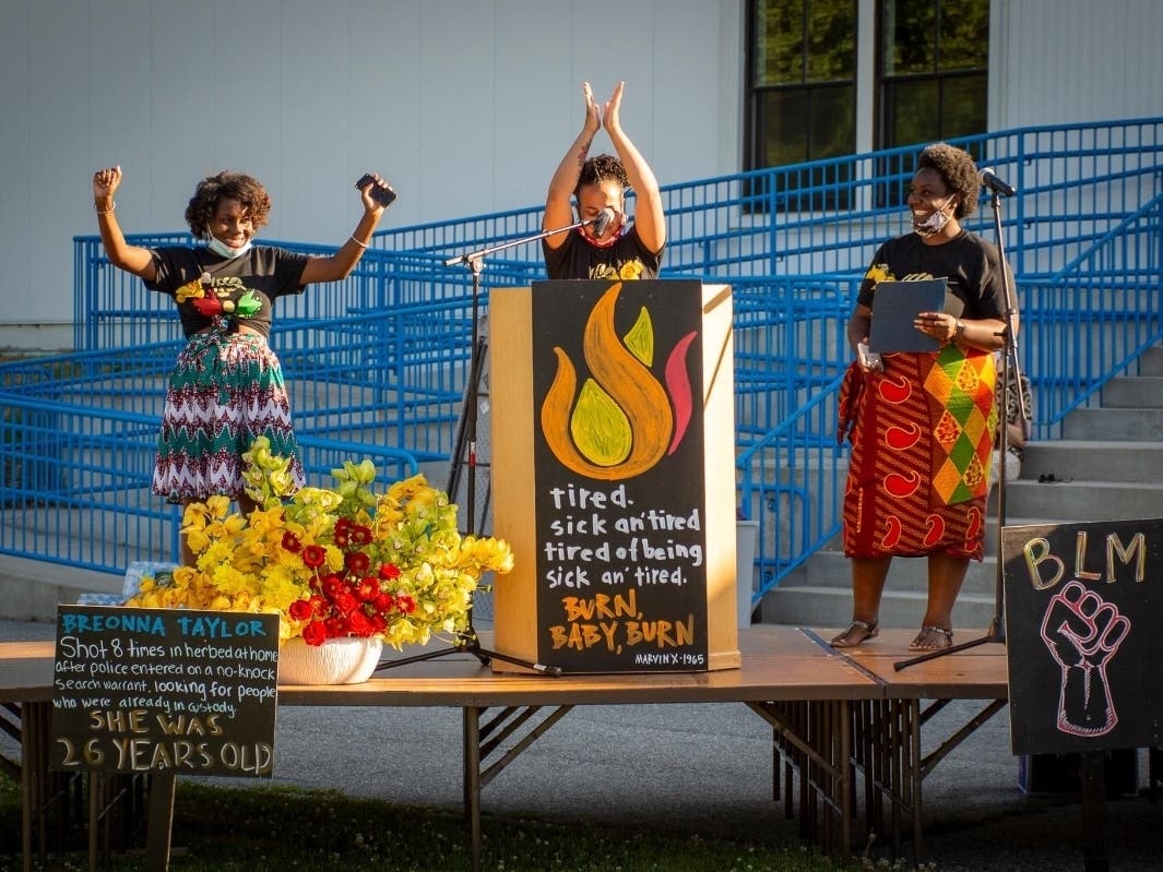 Bria Gadsden, Mayara Reis, Elizabeth Walther-Grant of Merrimack Valley Black and Brown Voices on stage at their Juneteenth event in Andover, June 19, 2020.