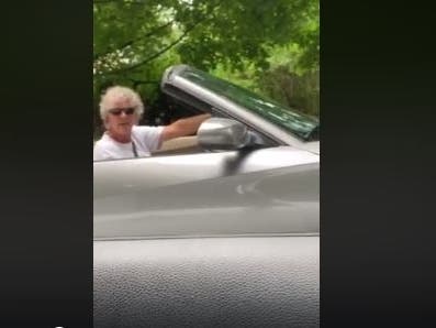 A white man in a BMW followed Groveland resident Julia Santos, who is Black, after she drove up his street to pick up dog food.