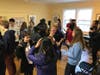 Students participate in a Dalcroze activity. Time, space, and energy!