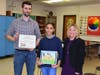 Yasmeen Darwich-Abdusalam is pictured with her art teacher Marco Antenucci and Fine Arts chairperson Theresa Bianco.