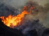 The Getty fire burns on Mandeville Canyon on Monday in Los Angeles.