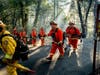 Inmate firefighters battle the Kincade Fire near Healdsburg, Calif., on Tuesday, Oct. 29, 2019.
