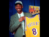 In this July 12, 1996 file photo Kobe Bryant, 17, jokes with the media as he holds his Los Angeles Lakers jersey during a news conference at the Great Western Forum in Inglewood, Calif. Bryant, a five-time NBA champion and a two-time Olympic gold medalist