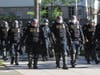 California Highway Patrol officers in riot gear stand during a protest against police violence at the State Capitol in Sacramento, June 1, 2020.