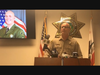 Santa Cruz County Sheriff Jim Hart addresses reporters Saturday with a photo of Sgt. Damon Gutzwiller over his shoulder.