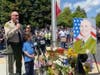 Sheriff Jim Hart speaks during a Sunday afternoon vigil honoring Sgt. Damon Gutzwiller.