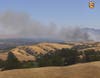 Wildfire cameras showed large plumes of smoke rising from the area Sunday afternoon.