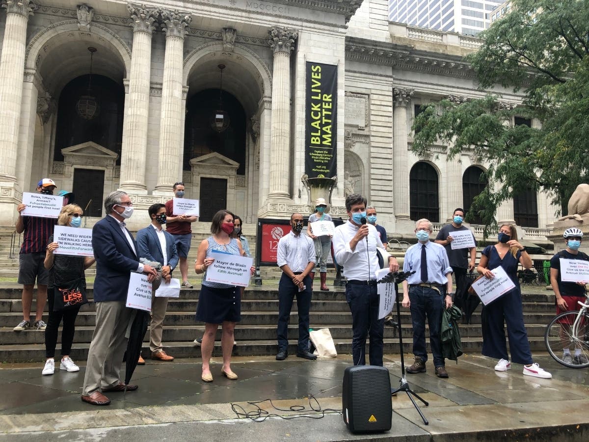 "New Yorkers deserve world-class transit," Marco Conner DiAquoi, deputy director of the advocacy group Transportation Alternatives, said at Thursday's rally on the steps of the Stephen A. Schwarzman library at Bryant Park.