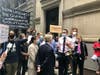 In the rally outside the Harmonia shelter on East 31st Street, speakers blasted Mayor Bill de Blasio's decision to move hundreds of men from the Lucerne Hotel on the Upper West Side over to the Harmonia in Midtown.