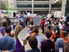 A crowd listens to speakers during a protest outside Hunter College at East 69th Street and Lexington Avenue, Friday, Sept. 18, 2020.