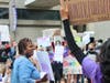 Judith Daniel, who graduated from Hunter College High School in 1979 and now serves on its alumni diversity committee, speaks during a protest calling on the school to improve its diversity practices, Friday, Sept. 18, 2020.