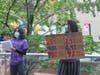 Hunter College High School students Durga Sreenivasan (left) and Chloë Rollock lead chants during a protest over the school's diversity and admissions practices, Friday, Sept. 18, 2020.
