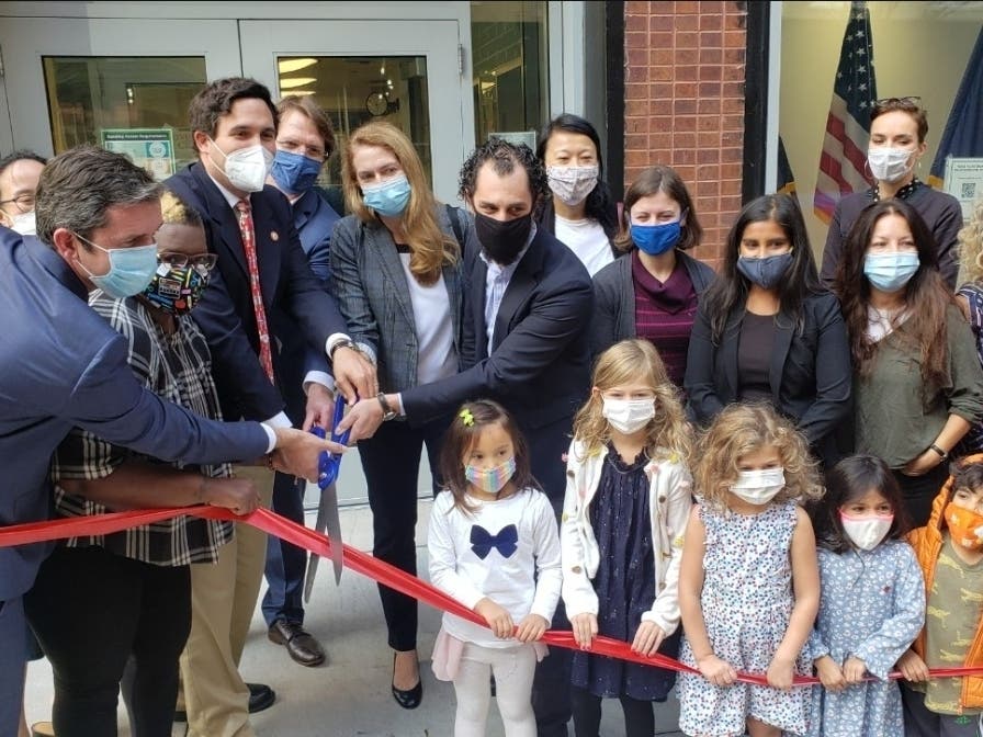Officials and families cut a ceremonial ribbon Friday for a French dual language program at the District 2 Pre-K Center on East 76th Street.