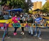 Kids at the Pleasant Avenue Open Street painted over an NYPD barricade with the message, "LOVE IS THE ANSWER."