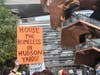 Posters promoting the demonstration, as well as at least one protester's sign, proclaimed, "House the Homeless in Hudson Yards" — the West Side megadevelopment at the southern end of Hell's Kitchen.