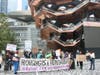 Speakers at the rally under Hudson Yards' giant Vessel sculpture took aim at the nearly $6 billion in government help that the complex's developers received from the city, saying it would have been better used increasing voucher assistance.