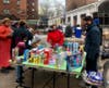 More than 500 toys, 100 books and a dozen gift cards were given away to families at the Holmes Towers and Isaacs HOuses.