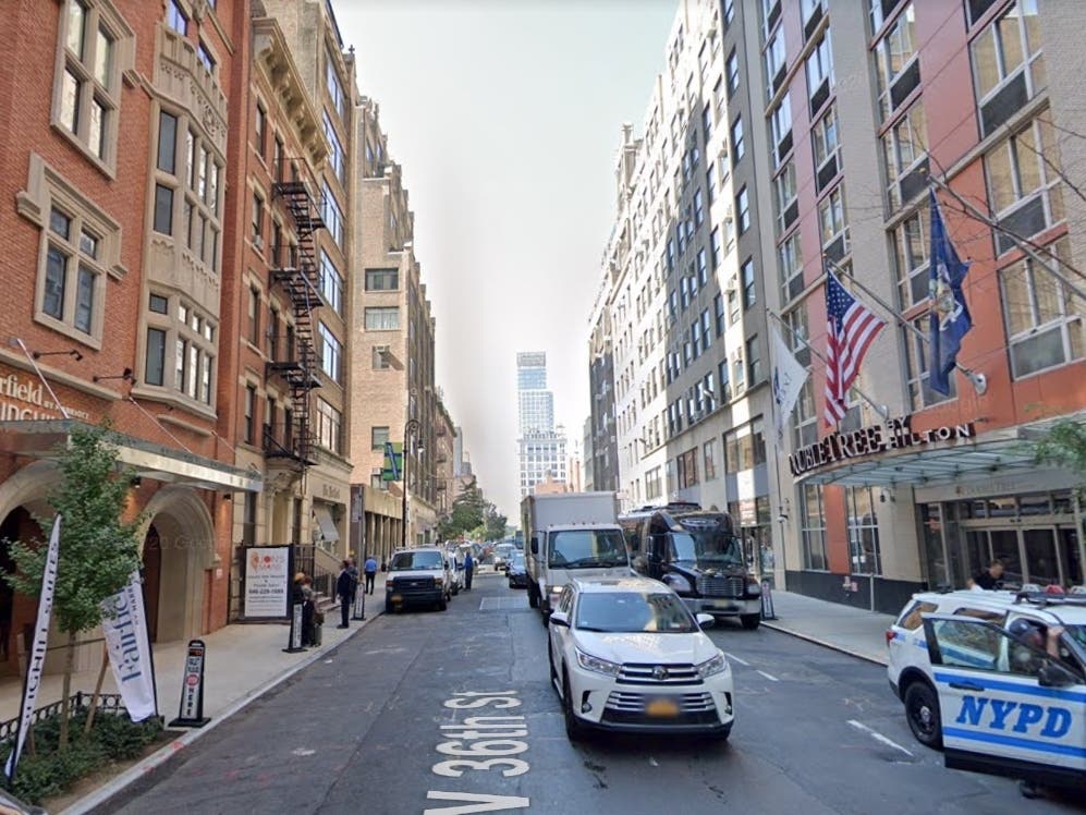 The city is moving 300 men from a temporary shelter at the DoubleTree Hotel (right). The SpringHill Suites (left) has also been converted into a shelter.