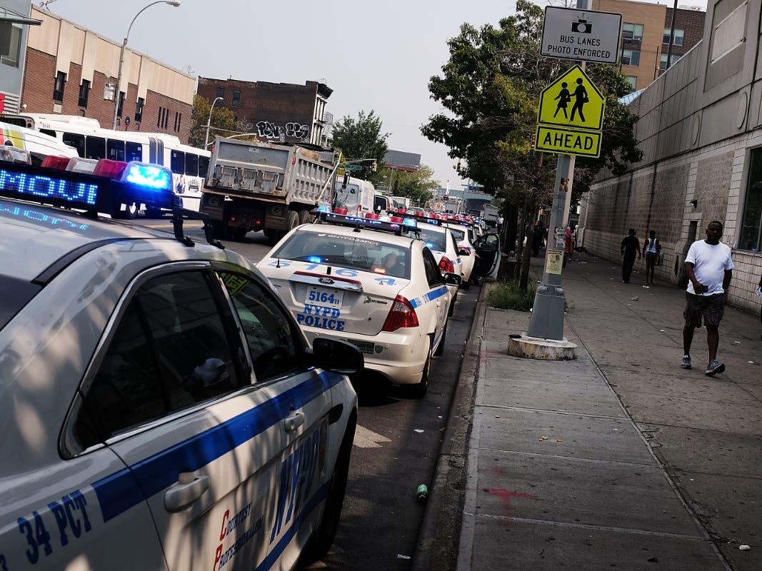 Police cars patrol East Harlem in September 2015. For years, neighborhood groups have complained that Harlem is overburdened by facilities that treat drug addiction.