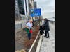 Volunteers clean up the East River Esplanade at Saturday's "Love Your Neighborhood Day."