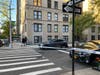 A roped-off car on East 95th Street shortly after the shooting Monday afternoon.