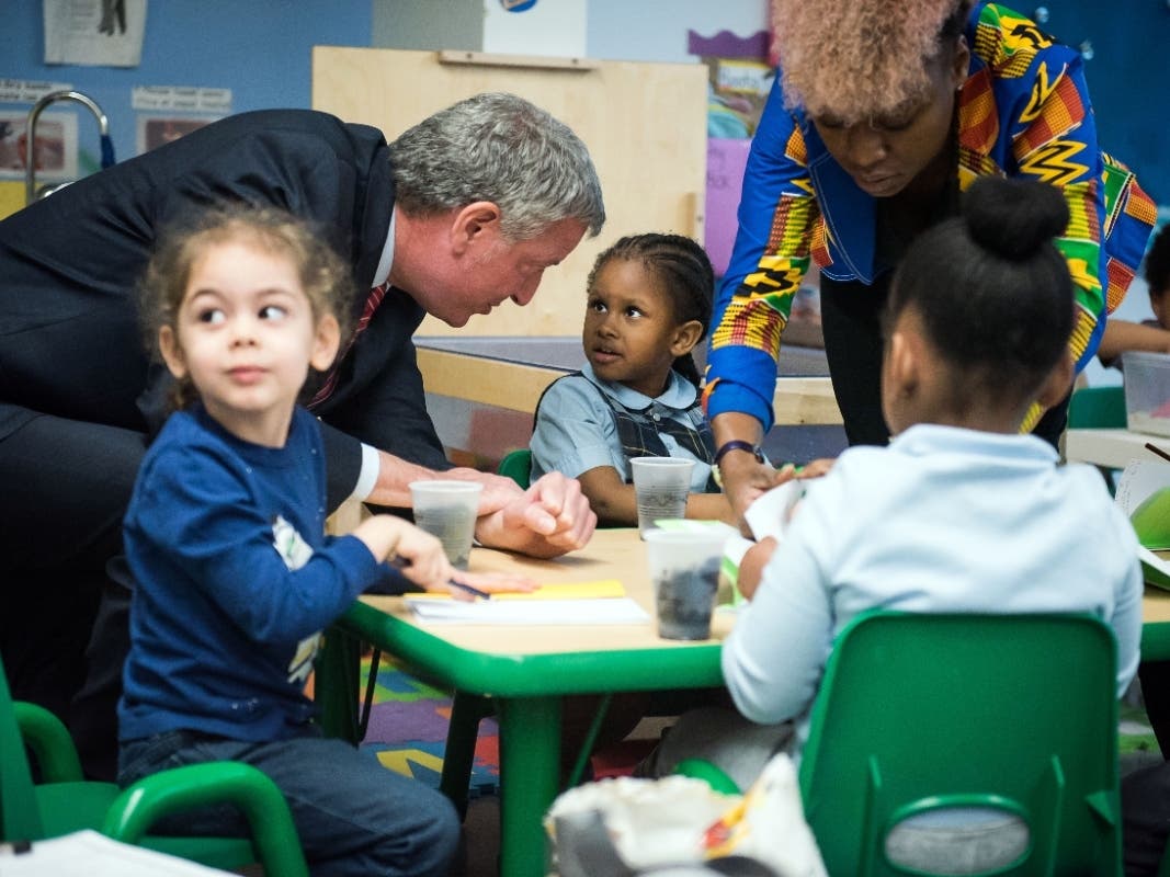 Mayor Bill de Blasio visits children at the Learning Through Play Pre-K Center in the Bronx on May 23, 2018, announcing an earlier expansion of 3-K for All.