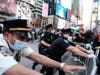 Pro Palestinian protesters face off with a group of Israel supporters and police in a violent clash in Times Square on May 20, 2021 in New York City.