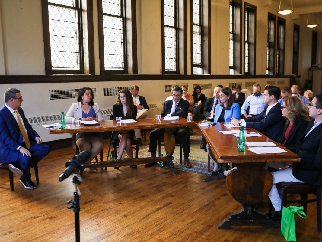 Tuesday's forum at St. Thomas More's Church included (left-right): moderator and NY1 reporter Roger Clark, Tricia Shimamura, Rebecca Lamorte, Marco Tamayo, Kim Moscaritolo, Billy Freeland, Julie Menin and Christopher Sosa.