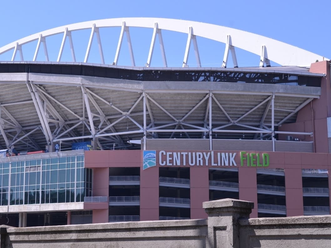 Investigators said several videos found on an employee's phone showed men using the bathroom at the stadium.