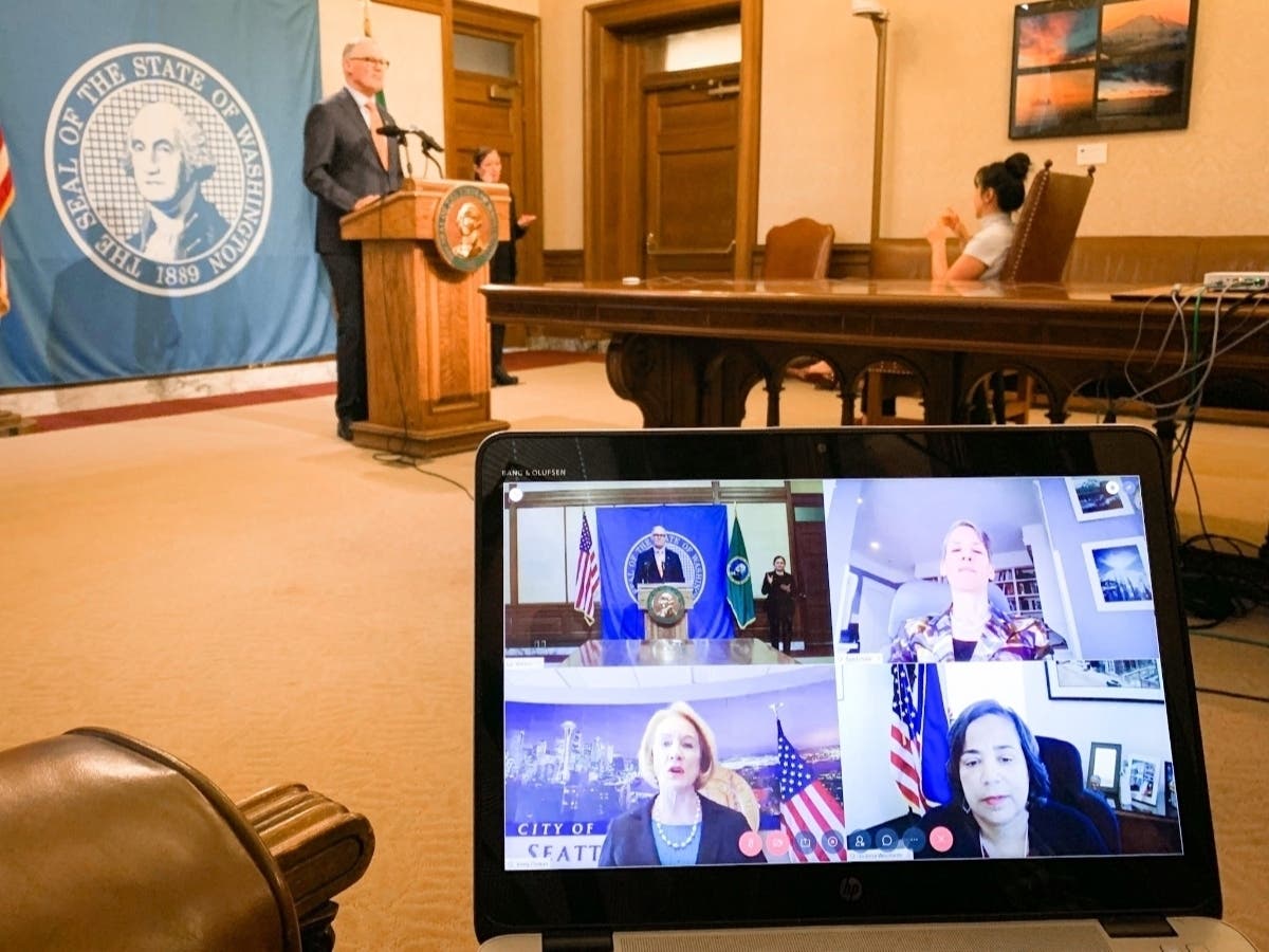 In keeping with social distancing measures, Gov. Inslee was joined virtually by the mayors of Seattle and Tacoma, and the commissioner of the Employment Security Department.