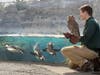 Buddy, a 7-year-old owl, poses with new friends at Woodland Park Zoo on March 24, 2020.