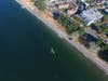 A pilot safely swam to shore Tuesday afternoon after crashing a Cessna 150 into Puget Sound near Alki Point in Seattle.