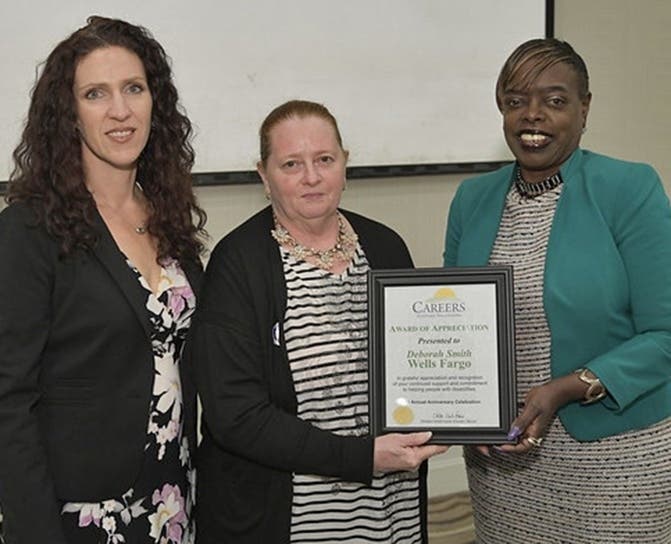 Deborah Smith of Wells Fargo, right, receives an Award of Appreciation from CAREERS Rebecca Appleyard and client Joann Gilleo.