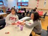 2025 MLK Day of Service volunteers participate in the Valentines for Veterans activity at the Fanwood-Scotch Plains YMCA. 