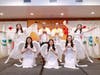 Dr. Hong, Tao-Tze, Prime Minister Briceño, and FOWPAL members dressed as angels pose for a group photo.
