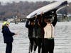 High School coxswain, Caroline Murphy, managing dock safety.