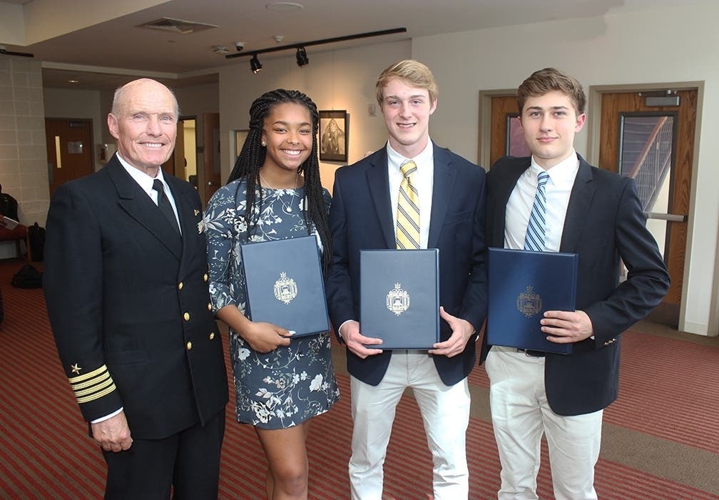 From Left: Captain Rick McGoey, Sarah Williams, George Burke, and John Trombetta
