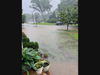 Rooster River overflowing into homes and yards on Sunday, September 13, 2026
