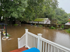 Rooster River overflowing into homes and yards on Sunday, September 13, 2026