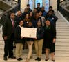 Roxbury Prep students joined their principal, Titciana Barros, as she was honored at the State House