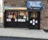 The storefront of the Excalibur Reading Program in Glendale-Queens.