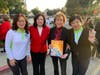 Valerie Biden Owens, vice chair of the Biden Institute at the University of Delaware, 2nd from right, and Hilda Solis, LA County Supervisor, 2nd form left, show support for International Conscience Day during a Lunar New Year celebration.