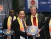 Dr. Hong, Tao-Tze, president of FOWPAL, center, presents the compass clock of conscience, celebrating the United Nations' designation of April 5 as the International Day of Conscience to Rhode Island Lieutenant Governor Daniel Mckee at the UN in New York.