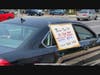 Posting a sign on his car, Tai Ji Men dizi Ray Chen drives around to attract people’s attention to the Taiwanese government’s human rights abuses against Tai Ji Men on August 16, 2020. 