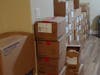 Boxes of dialysis solutions fills part of our bedroom and office
