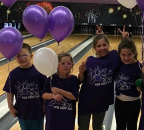 Young bowlers ham it up at a Bowl for Kids' Sake event in 2018.