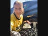 Maltese morphs into Autocare-with her Commack home-based Team RAH RAH ensemble 