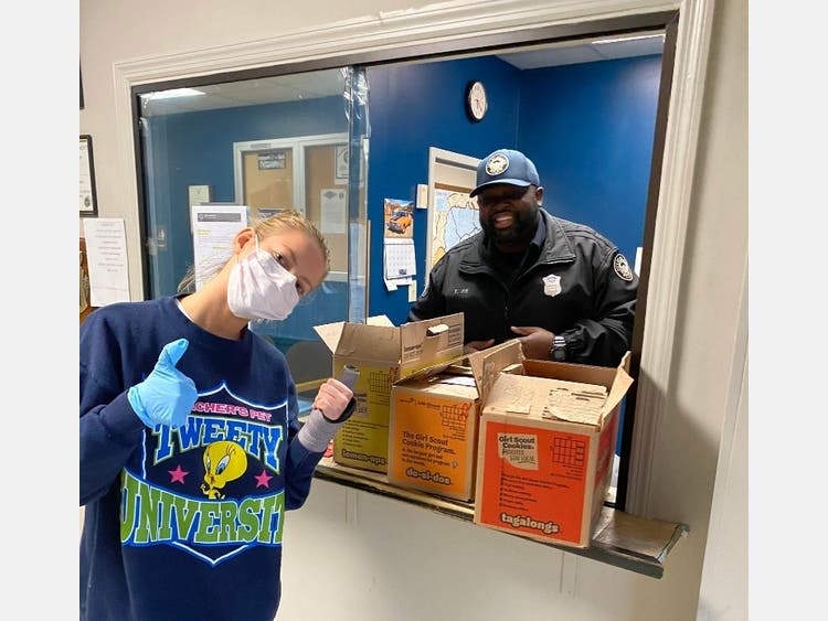 Sheridan Stevens drops off cookie donations to police officers and firefighters in Atlanta. 