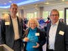 Kaye Kharasch accepted the Business of the Year award with presenters Chad Waynee and Rick Franklin at the DBR Chamber of Commerce 95th Annual Holiday Luncheon.