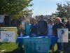 Staff from LMCCC by their table at the "Out of the Darkness" walk at Harbor Island Park